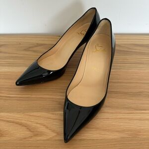 Christian Louboutin patent pumps in size 7
